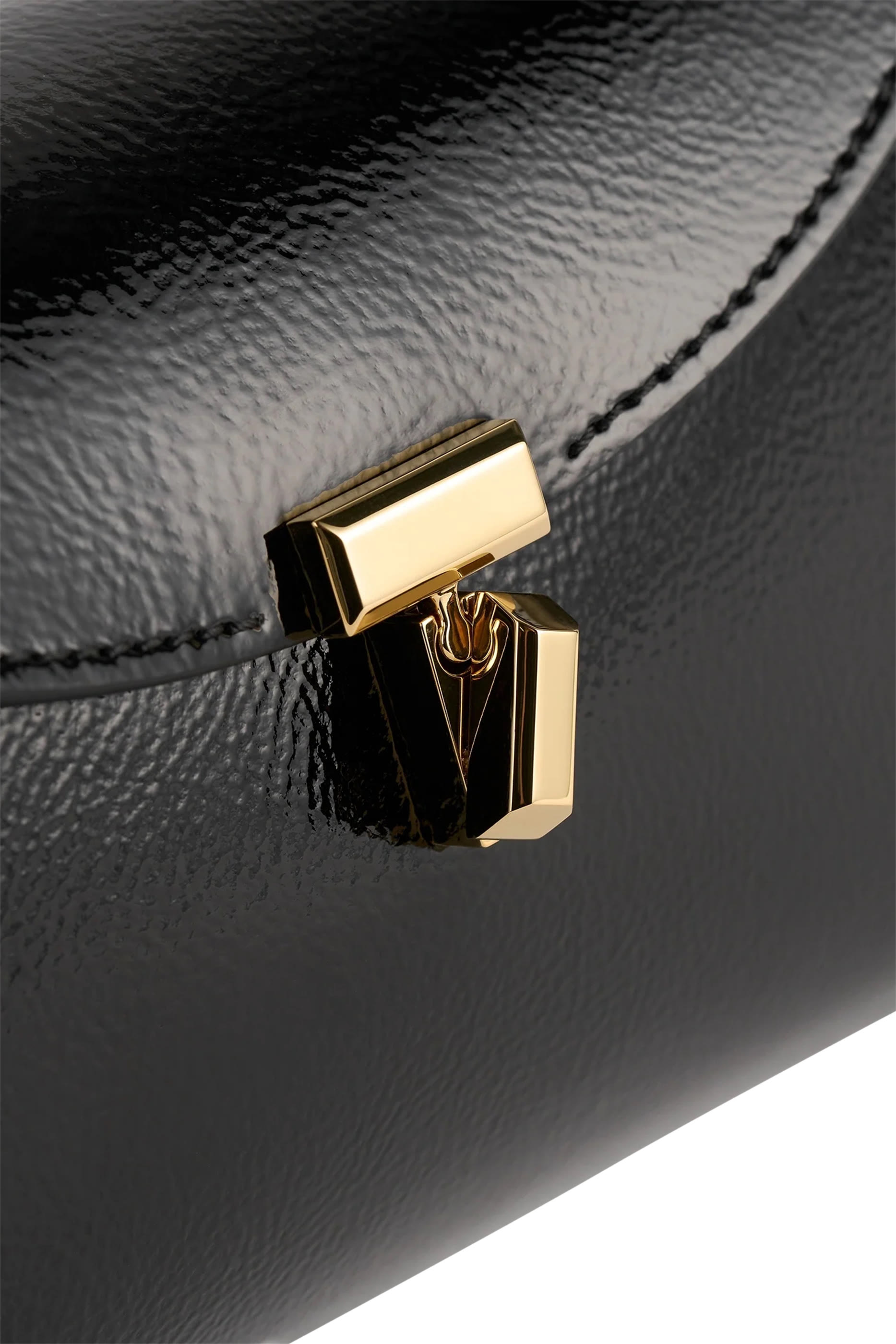 Mini T-Lock Naplack Clutch