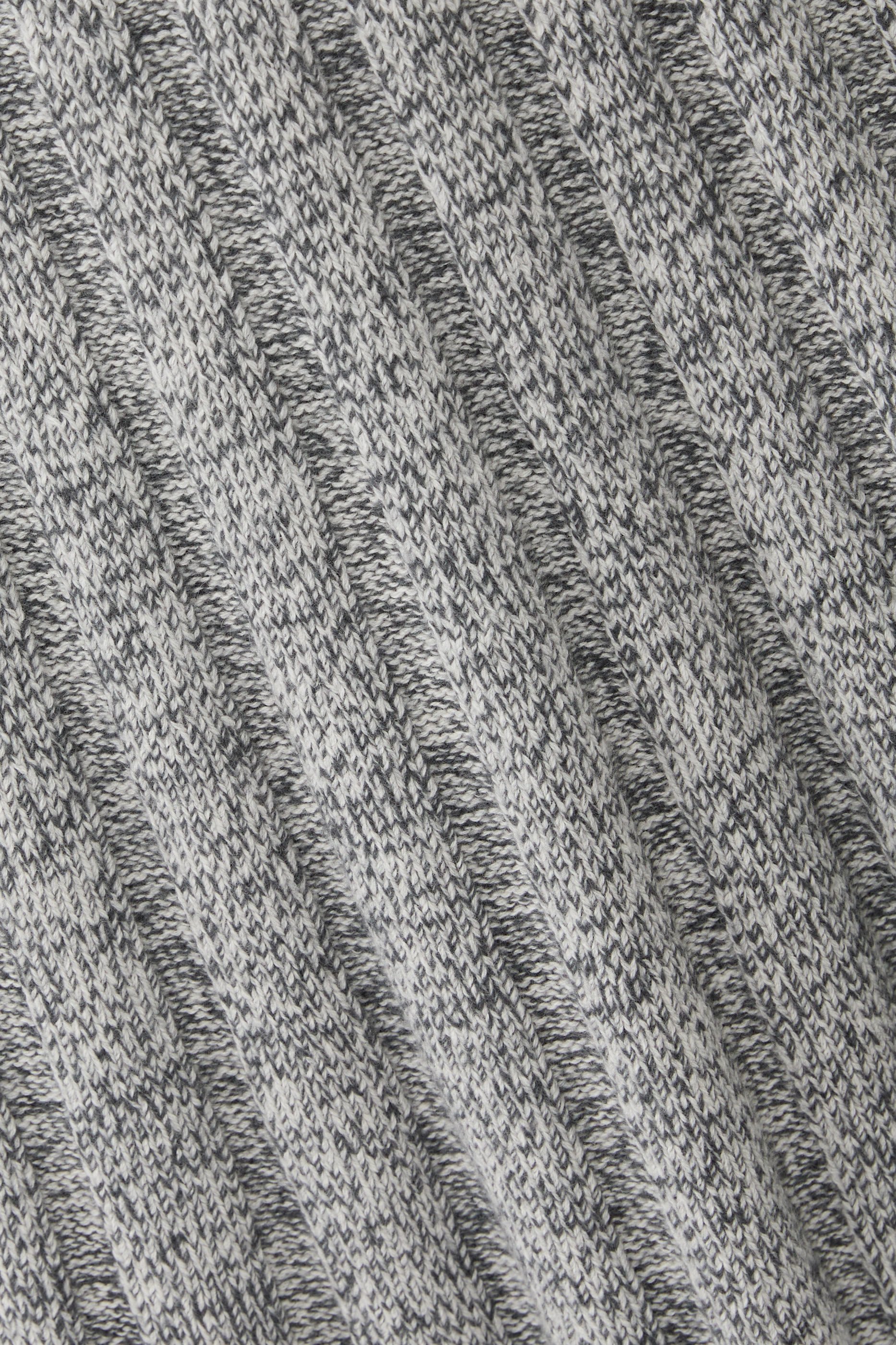 The Pleated Midi Skirt